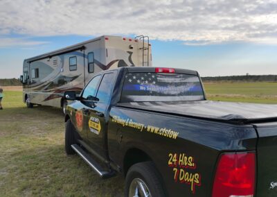 Black towing and recovery truck